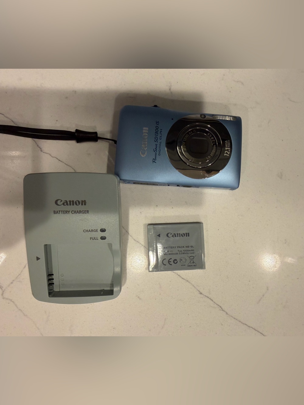 Canon Power Shot SD1300 IS digital camera features a 12.1-megapixel CCD sensor
